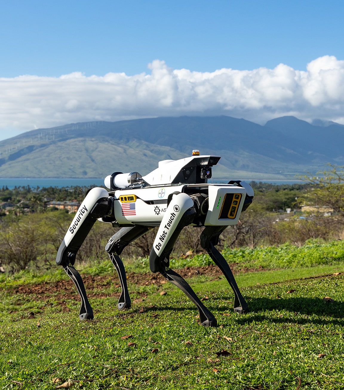 Spot equipped for perimeter security outside at an agri-tech facility