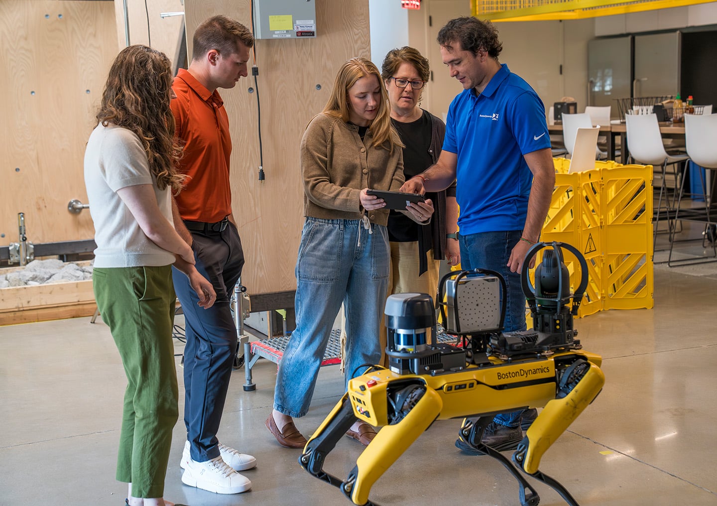Learners are guided through operating Spot by a Boston Dynamics trainer