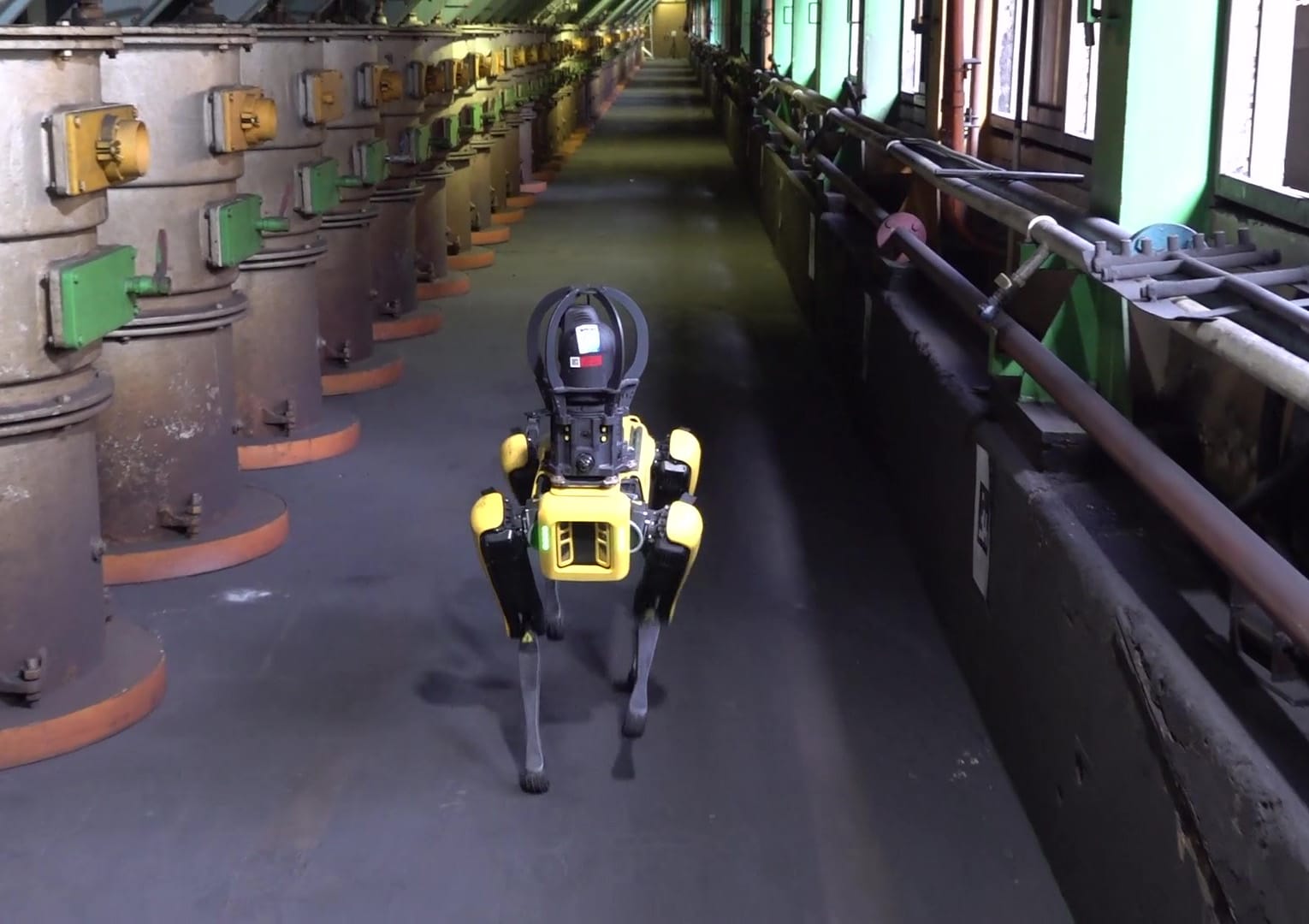 A Spot robot with thermal camera walks through a POSCO steelworks facility