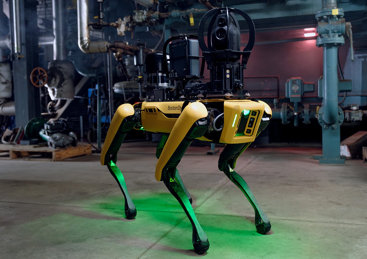 Spot robot in an industrial setting with several sensors to help it see the world around it